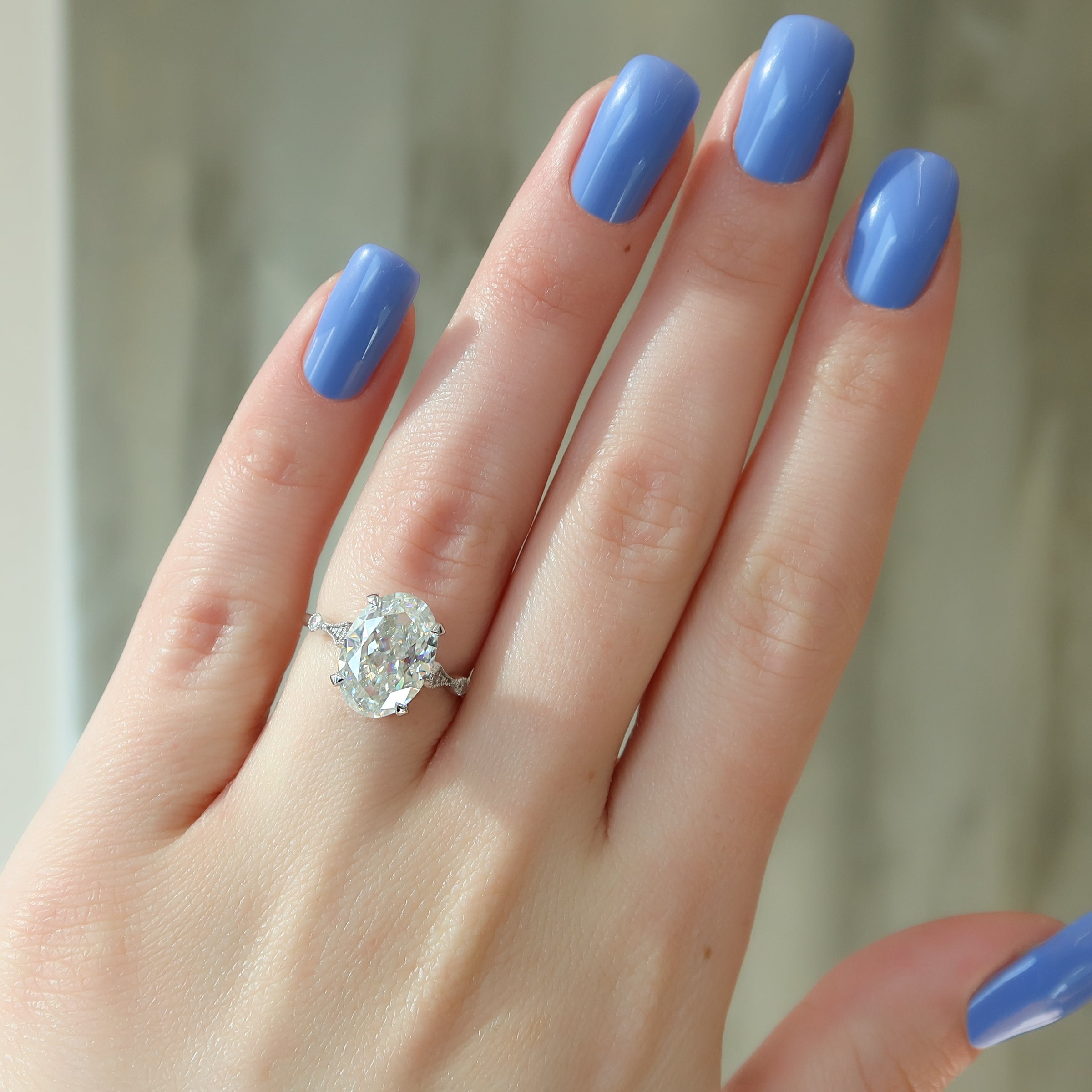 Oval Cut Diamond Engagement Ring with Pavé Side Stones – Elegant White Gold Ring
