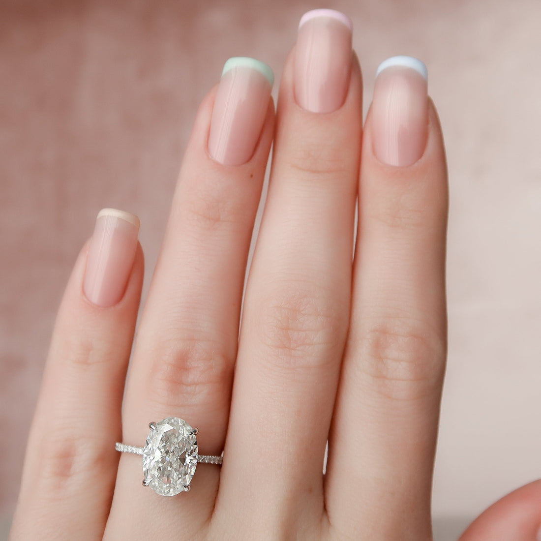 Oval Cut Diamond Engagement Ring with Pavé Diamond Band