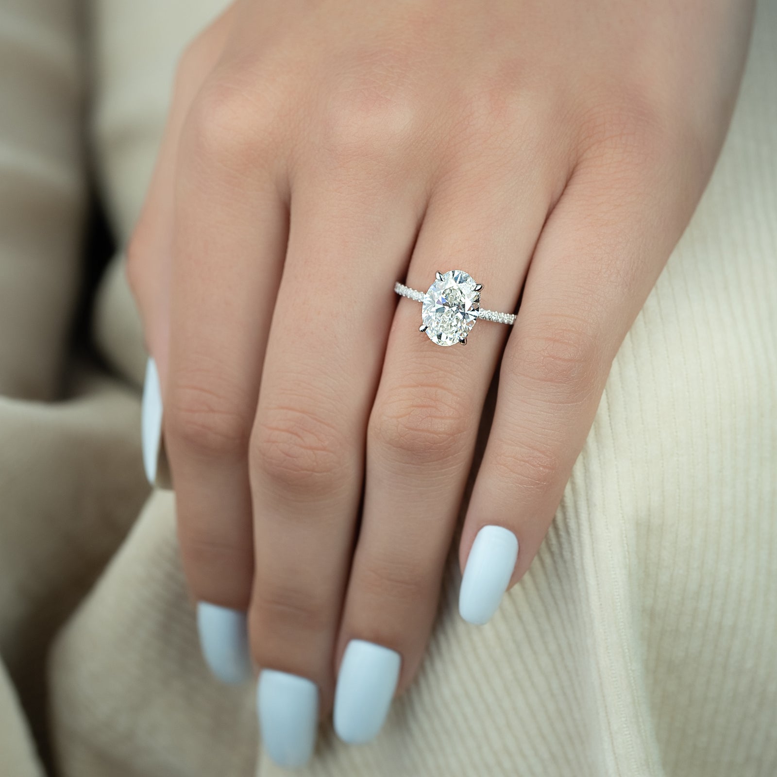 Oval Cut Diamond Engagement Ring with Pavé Diamond Band