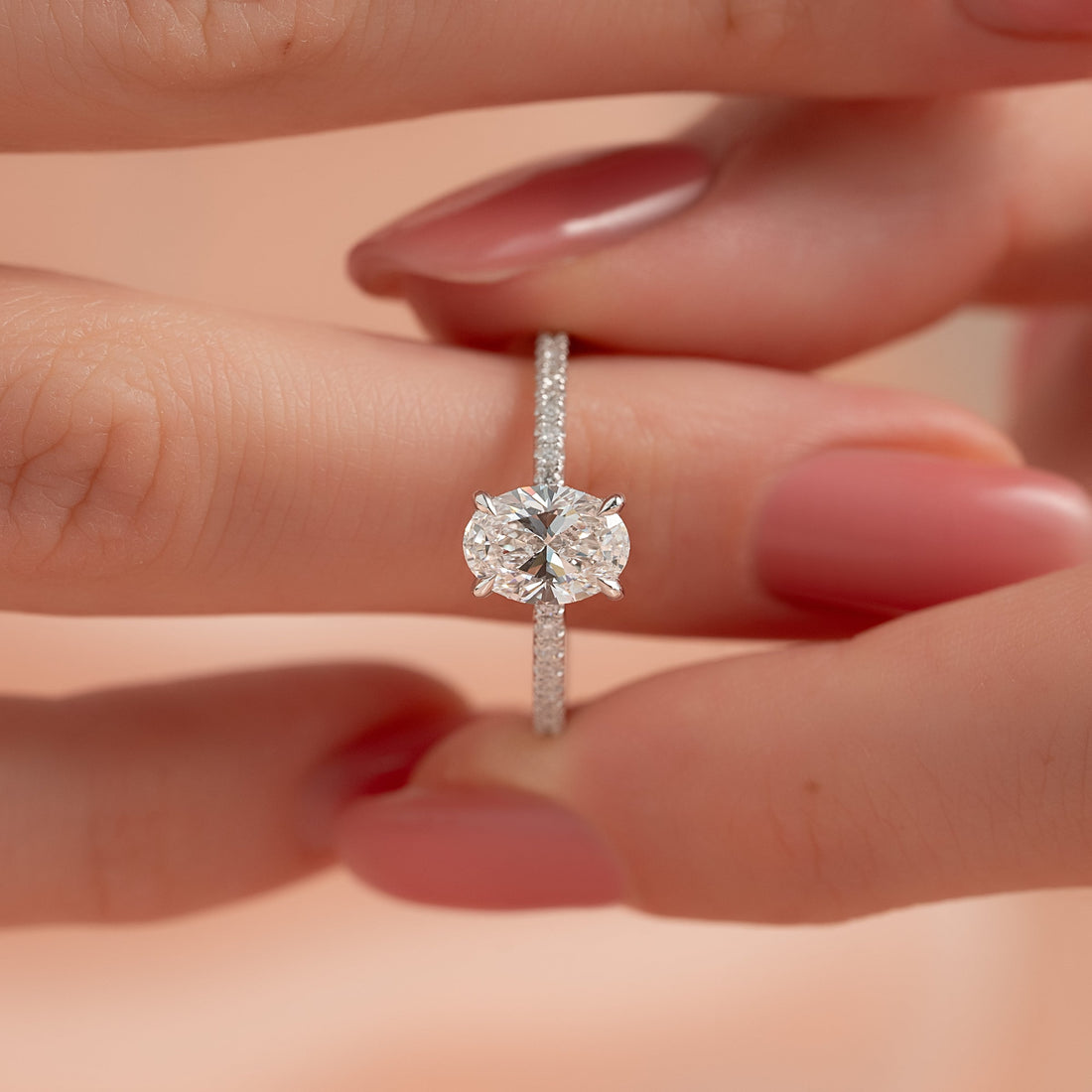 Oval Cut Diamond Engagement Ring with Pavé Diamond Band