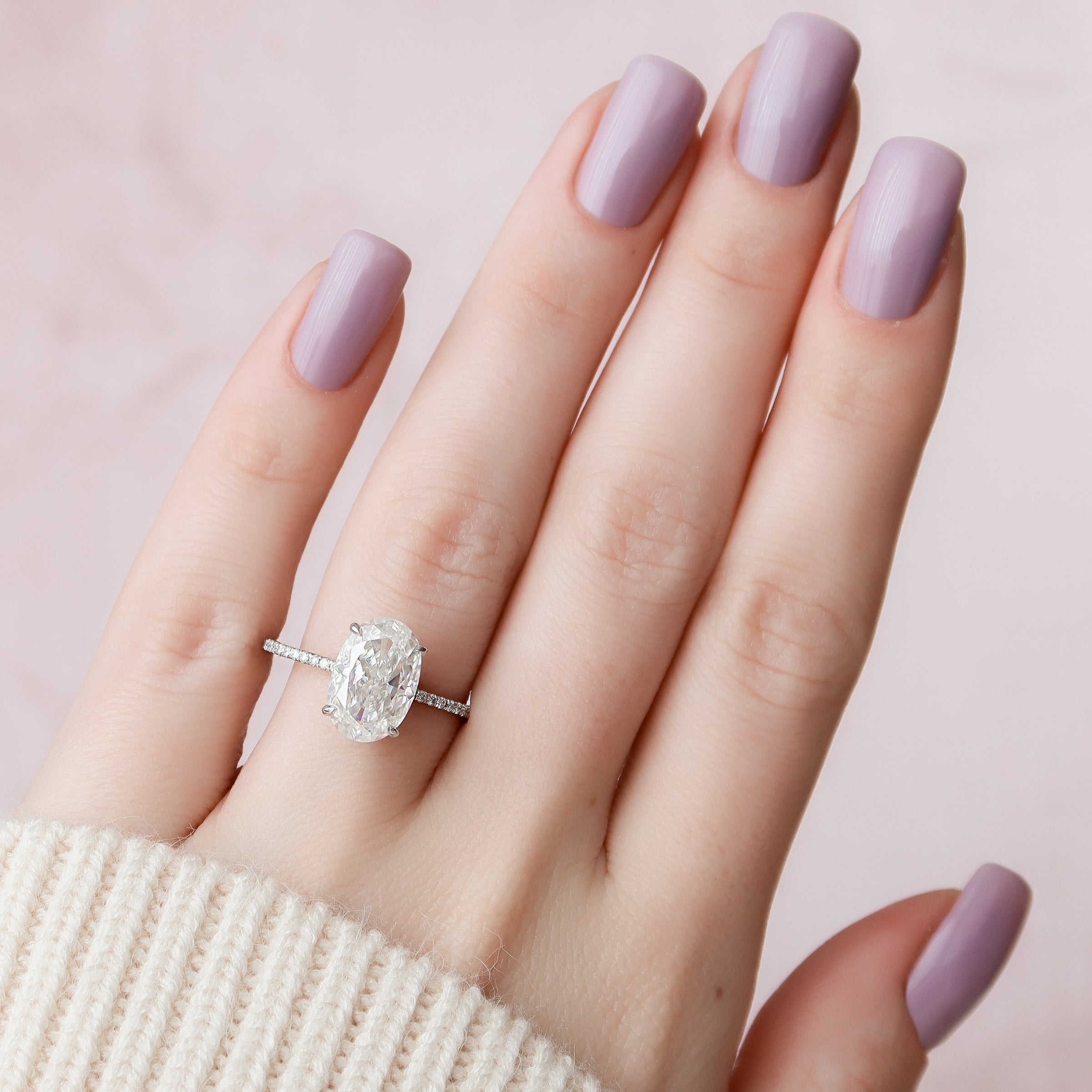 Oval Cut Diamond Engagement Ring with Pavé Diamond Band