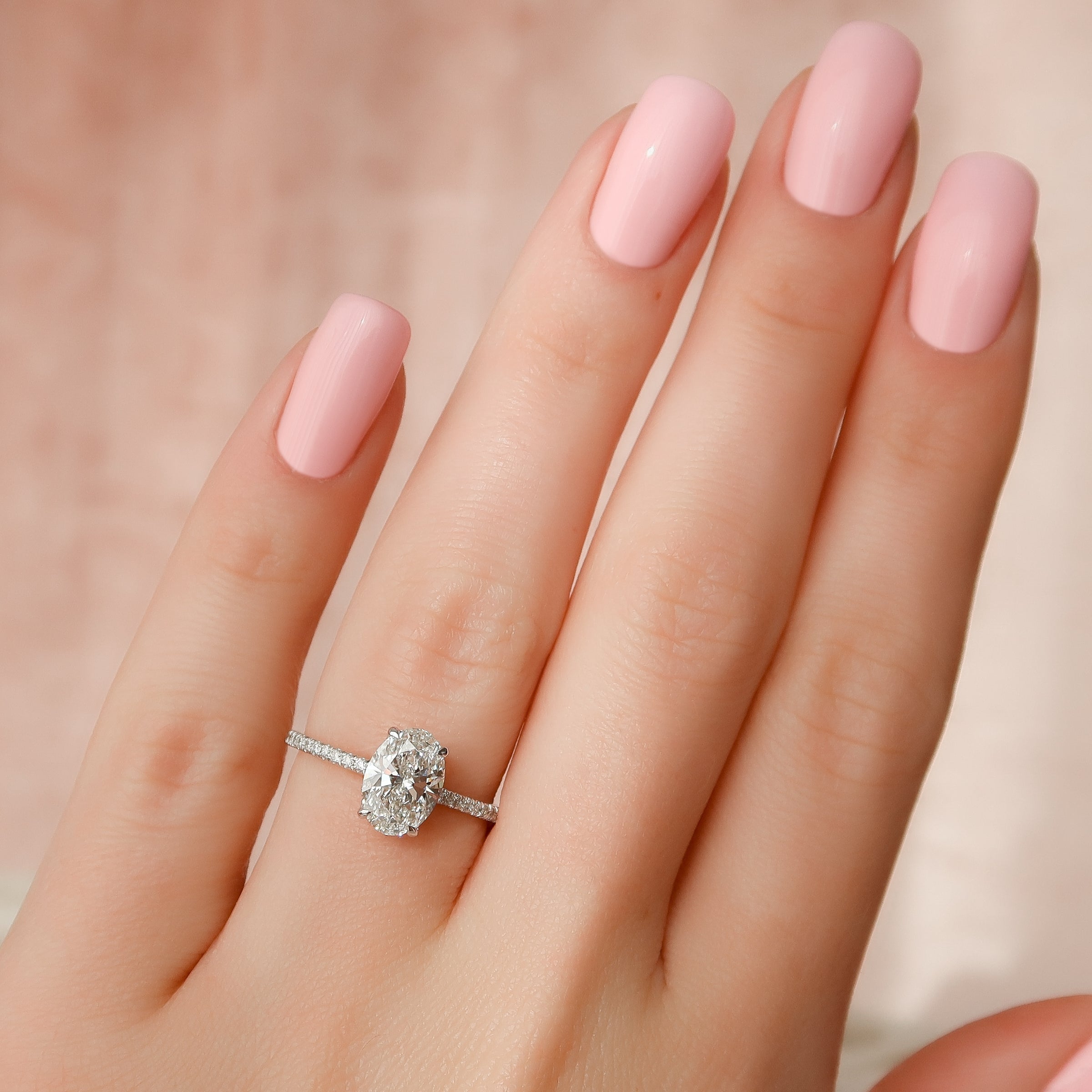Oval Cut Diamond Engagement Ring with Pavé Diamond Band
