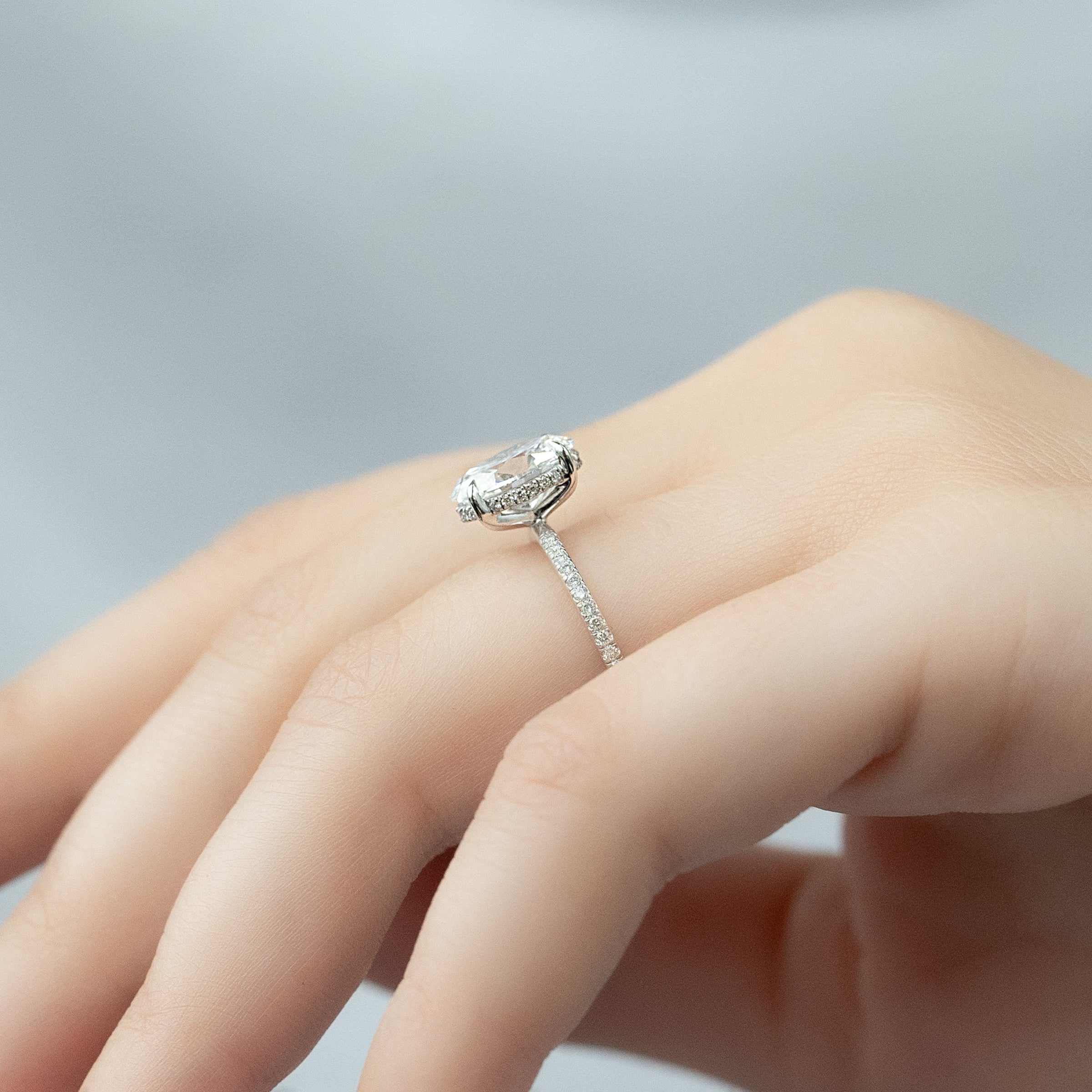 Oval Cut Diamond Engagement Ring with Pavé Diamond Band