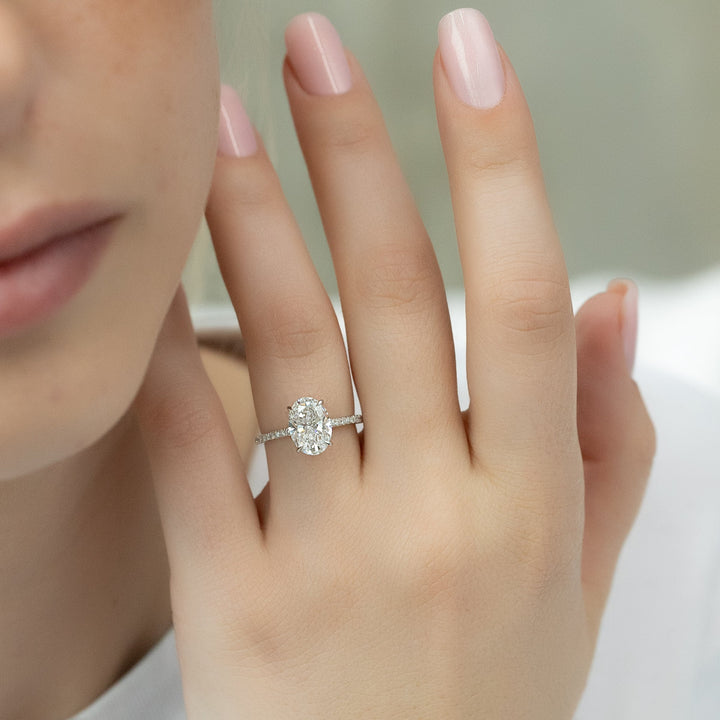 Oval Cut Diamond Engagement Ring with Pavé Diamond Band