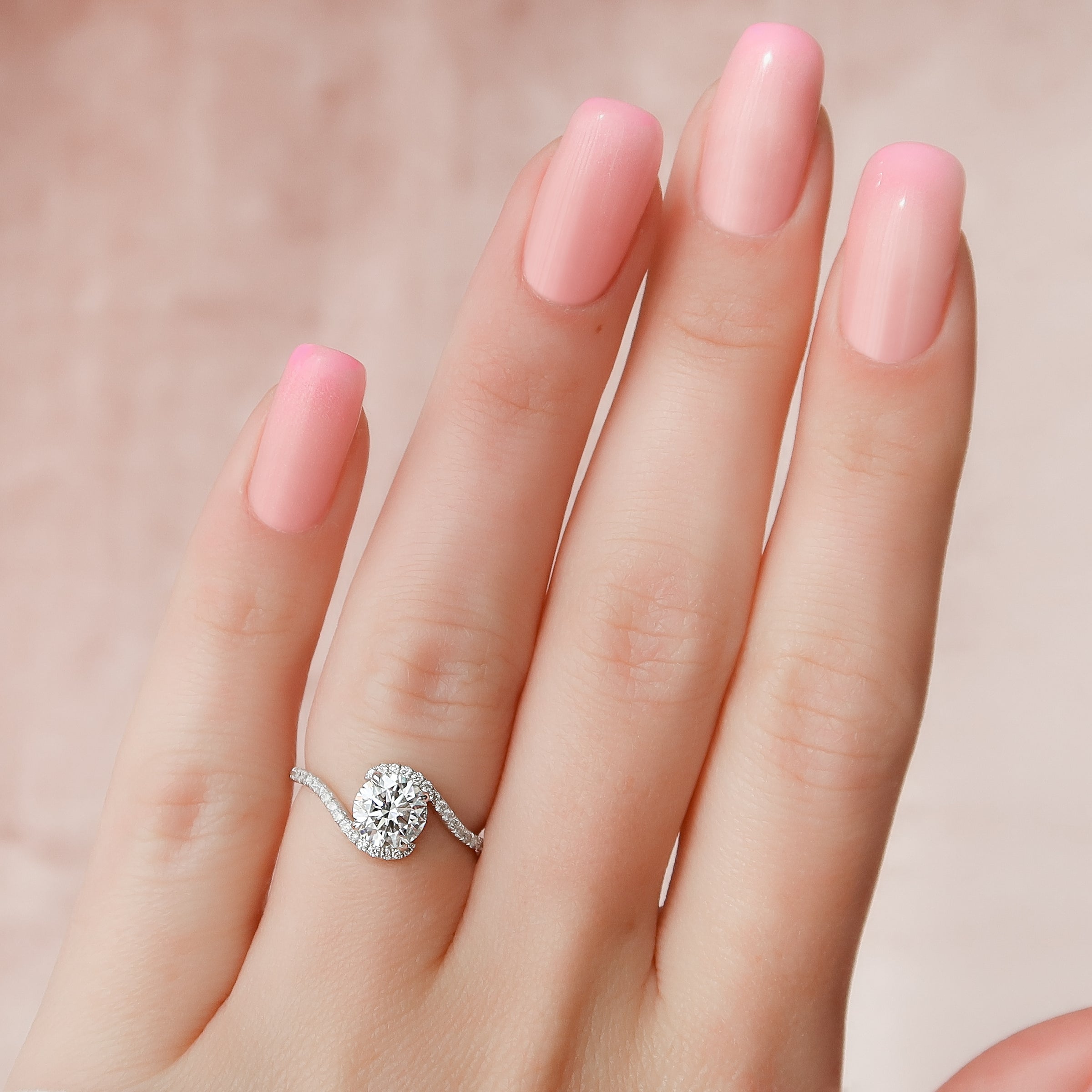 Round Cut Diamond Engagement Ring with Pavé Twist Band