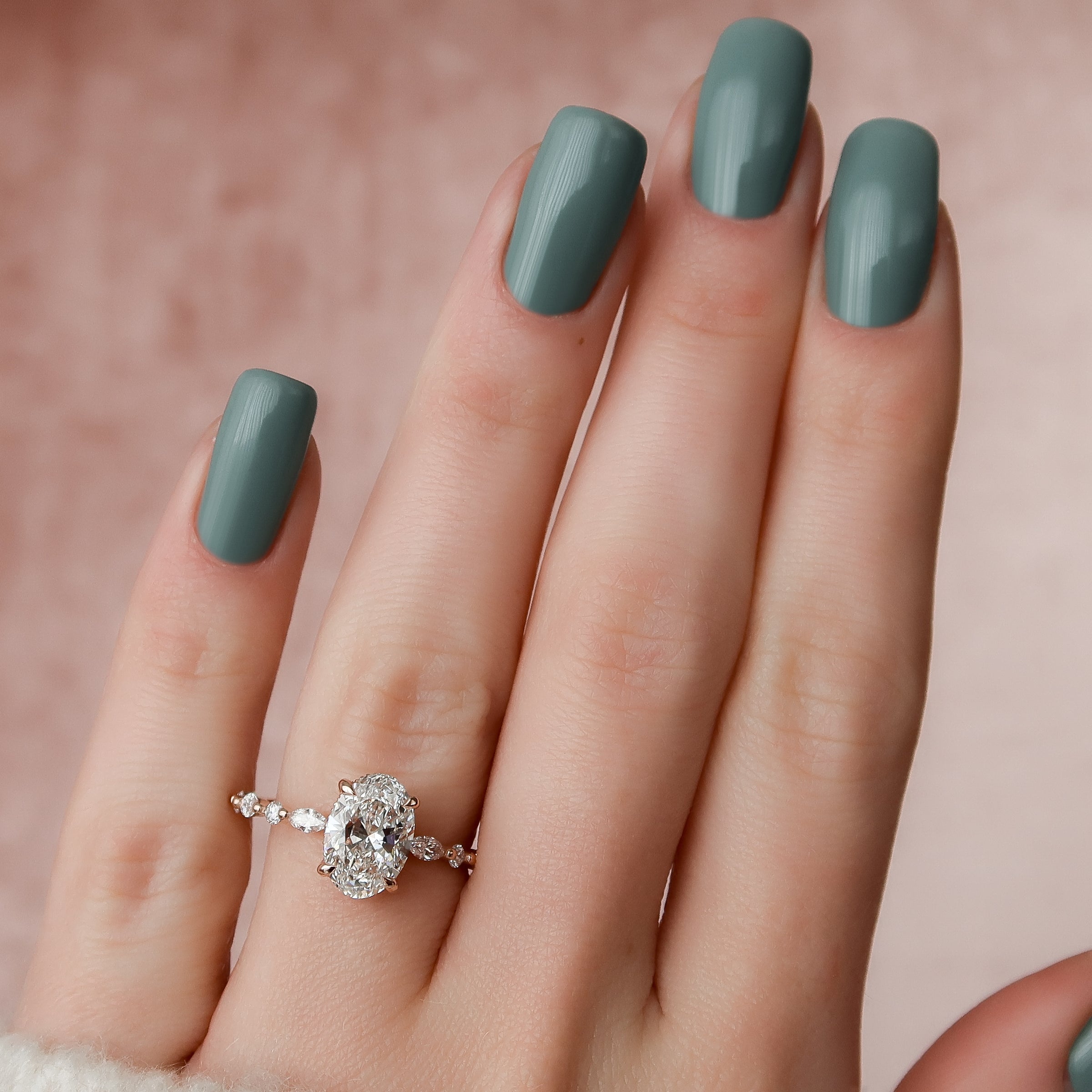 Oval Cut Diamond Engagement Ring in Rose Gold with Pavé Accent Stones