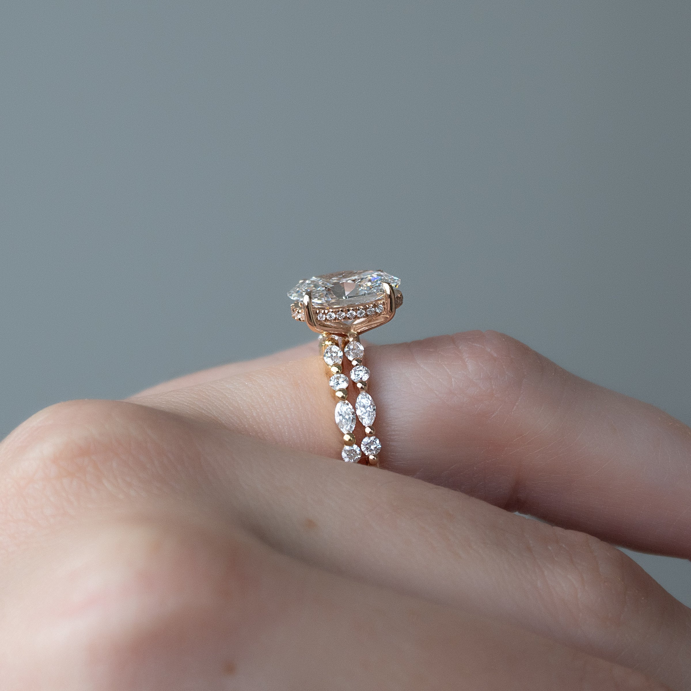 Oval Cut Diamond Engagement Ring in Rose Gold with Pavé Accent Stones