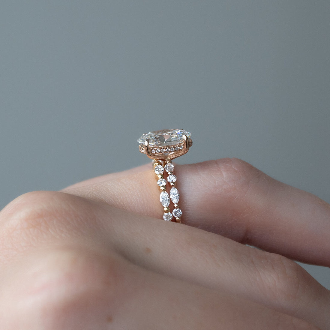 Oval Cut Diamond Engagement Ring in Rose Gold with Pavé Accent Stones