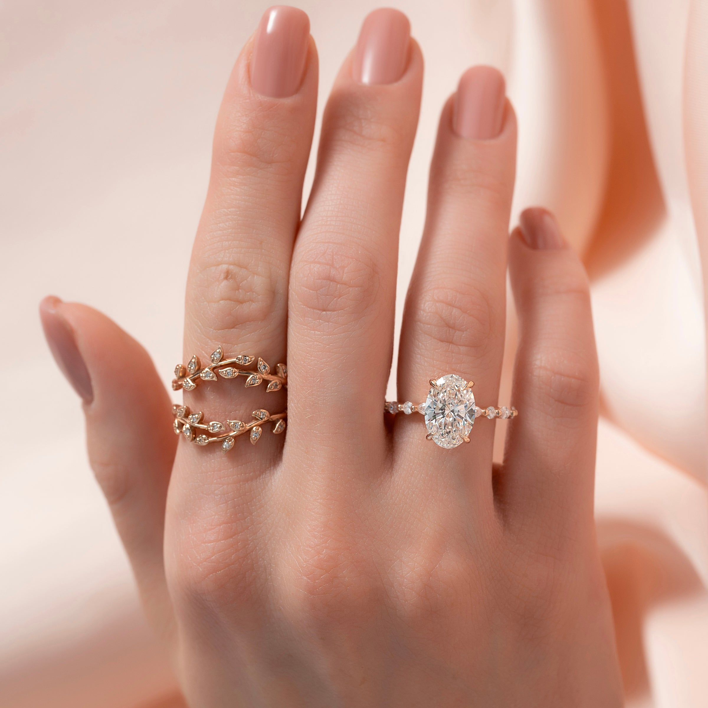 Oval Cut Diamond Engagement Ring in Rose Gold with Pavé Accent Stones