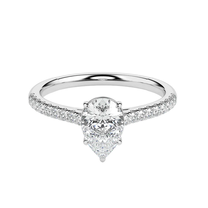 Diamond ring with a pear-shaped center stone on a white background