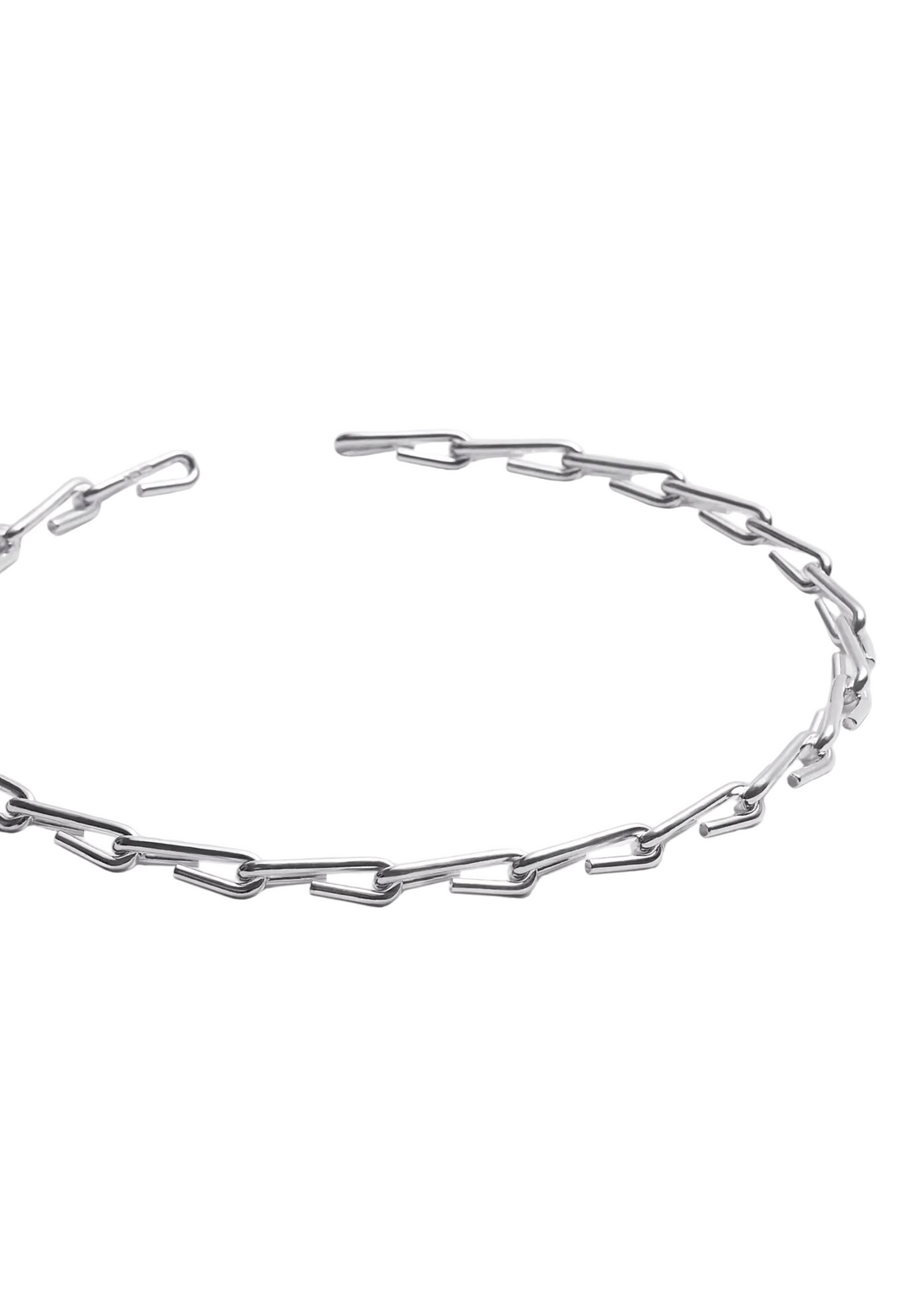 A silver-toned metal chain necklace with elongated, polished paperclip-style links, displayed on a clean white background.