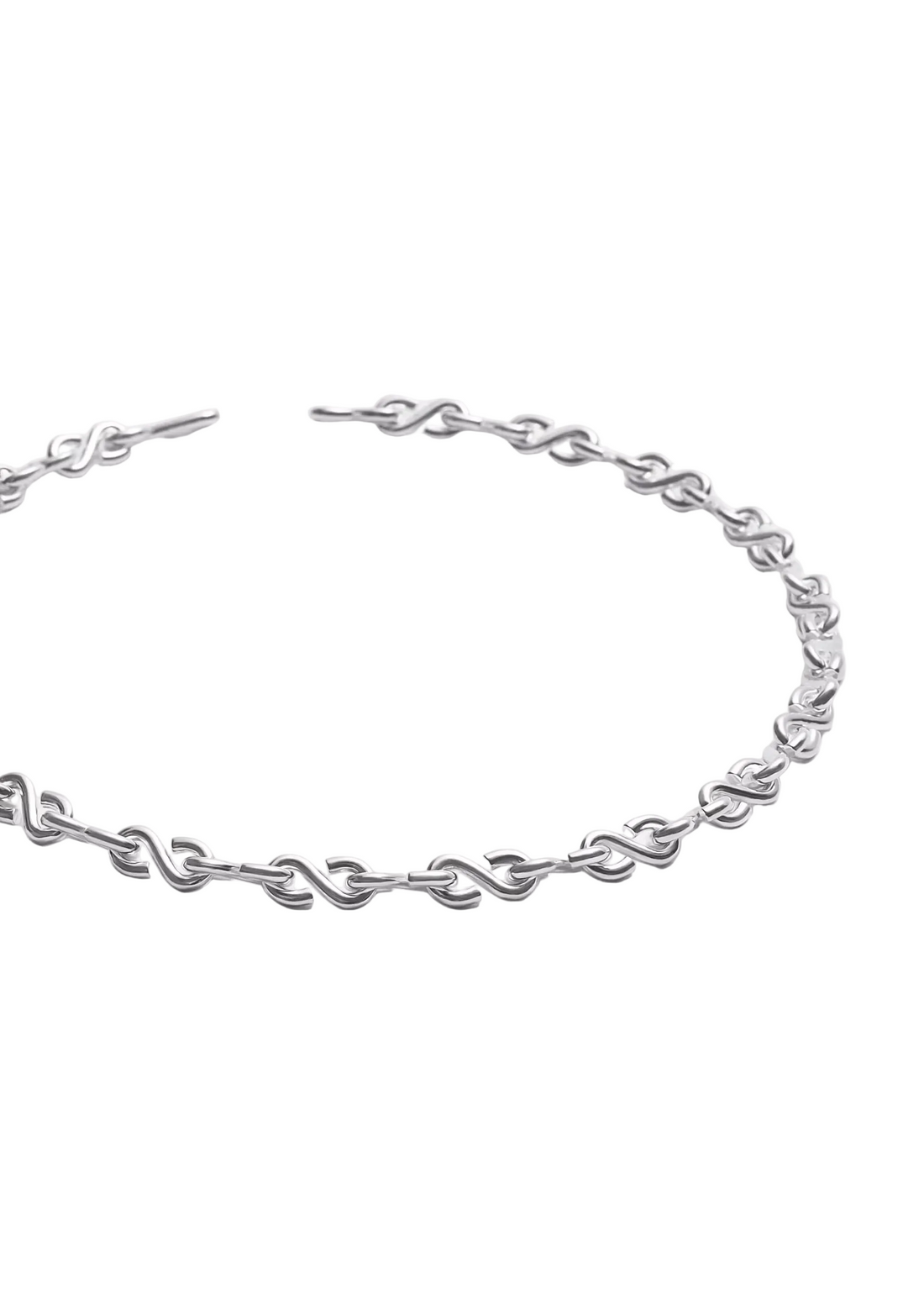 A silver-toned metal chain necklace with a unique interlocking link design, displayed on a clean, light gray background.