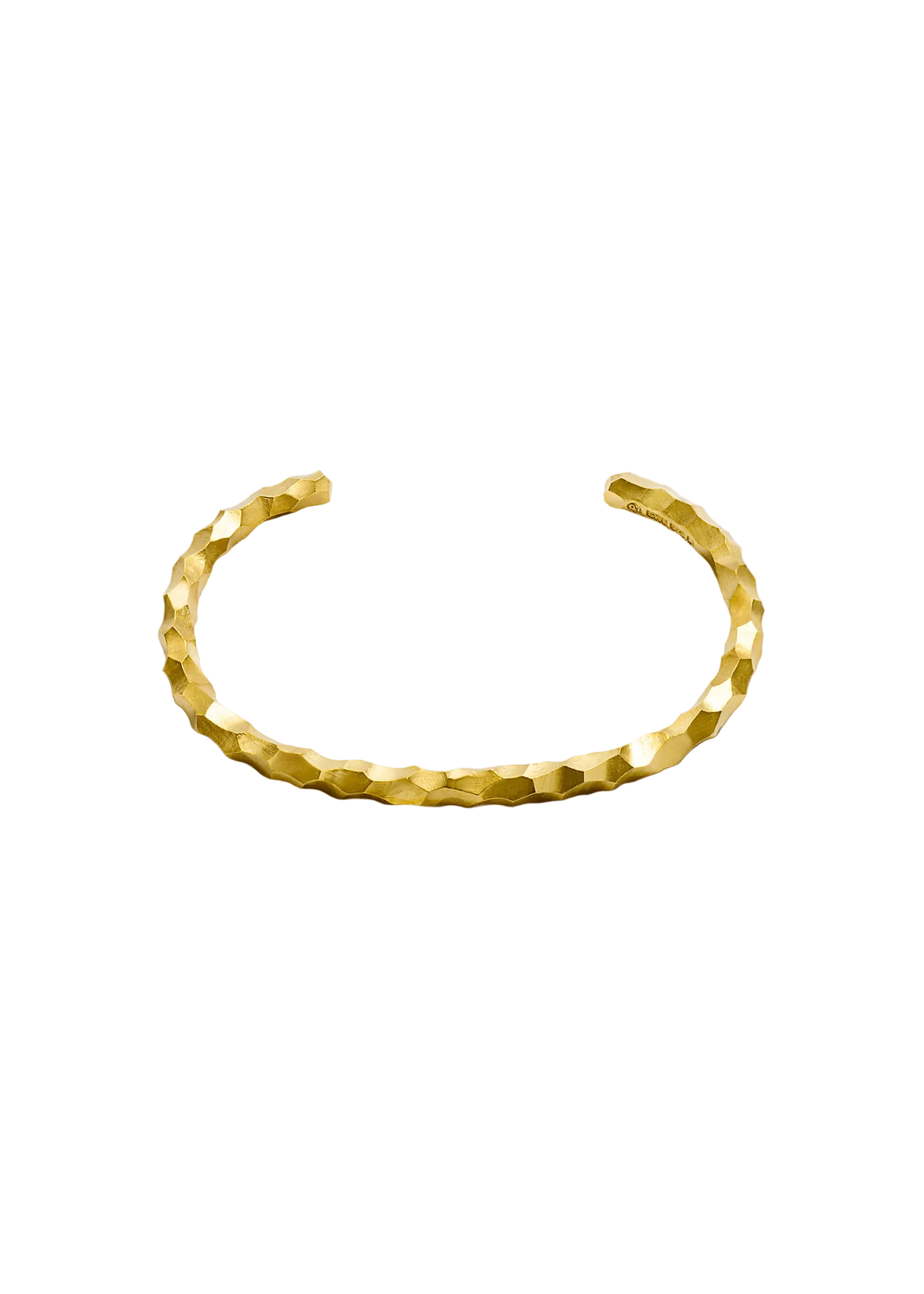 A textured gold bangle bracelet with a hammered, faceted geometric pattern, displayed on a clean white background.