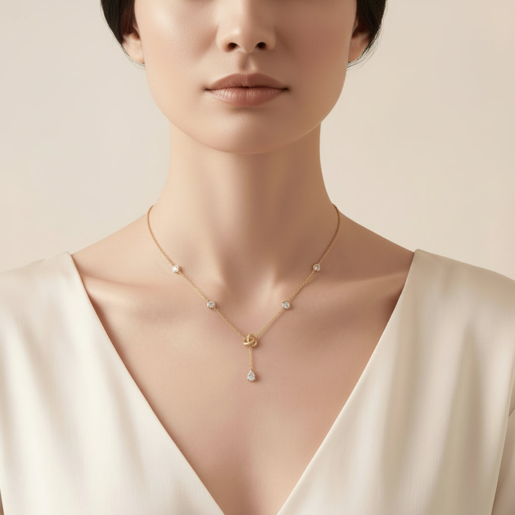 Gold & Silver Pendant with Crystal Knot Design and Teardrop Pendant