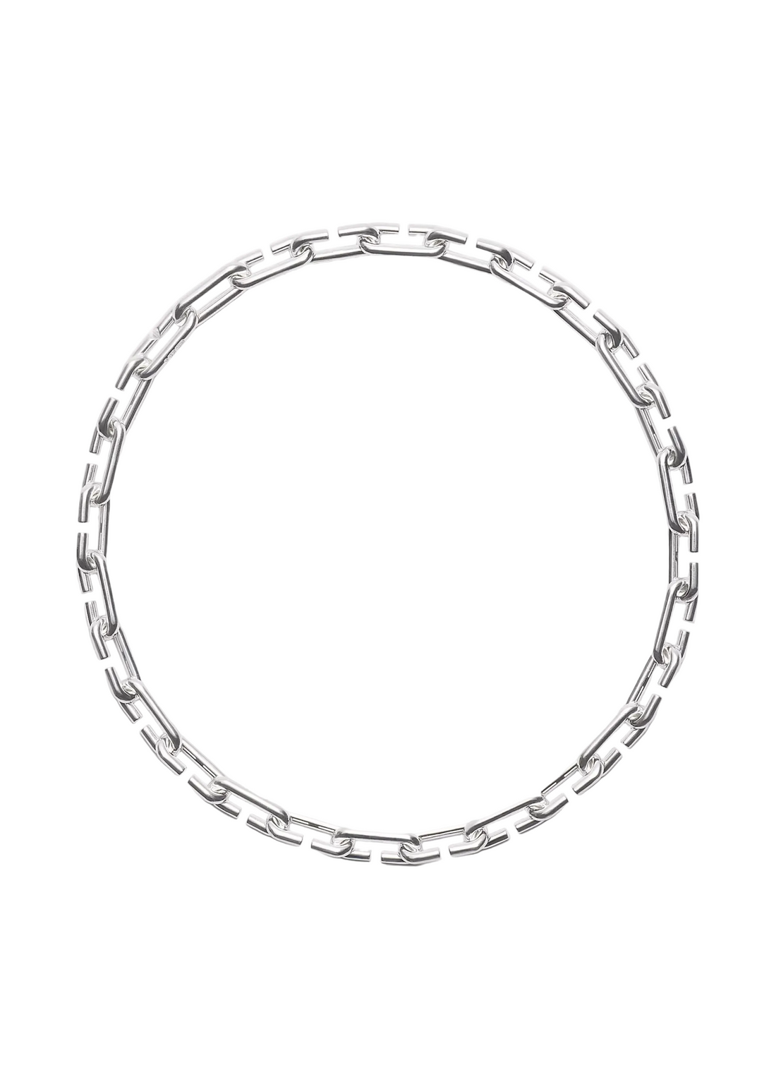 A silver-toned metal link chain necklace arranged in a loose circle on a plain light gray background.