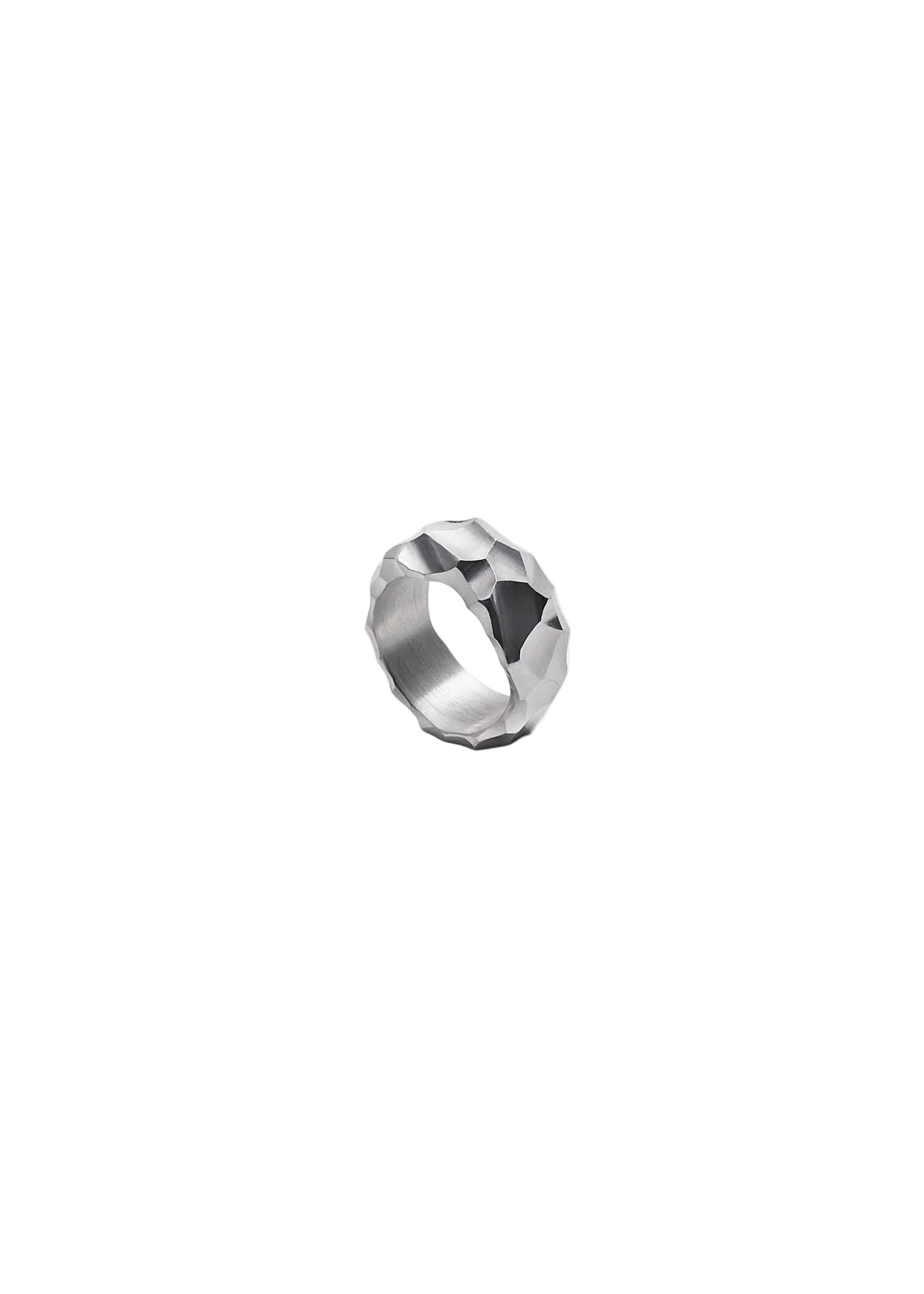 A silver ring with a faceted, geometric textured design, photographed on a clean white background.
