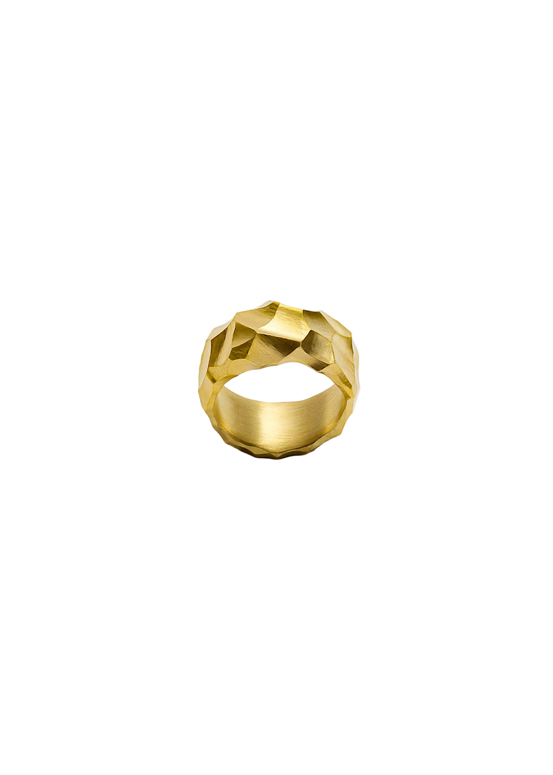 A textured, faceted gold ring photographed from above on a clean, light gray background.
