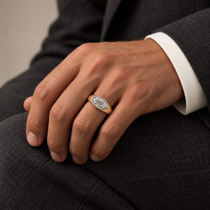 Man wearing the elongated hexagon lab-grown diamond signet ring in yellow gold