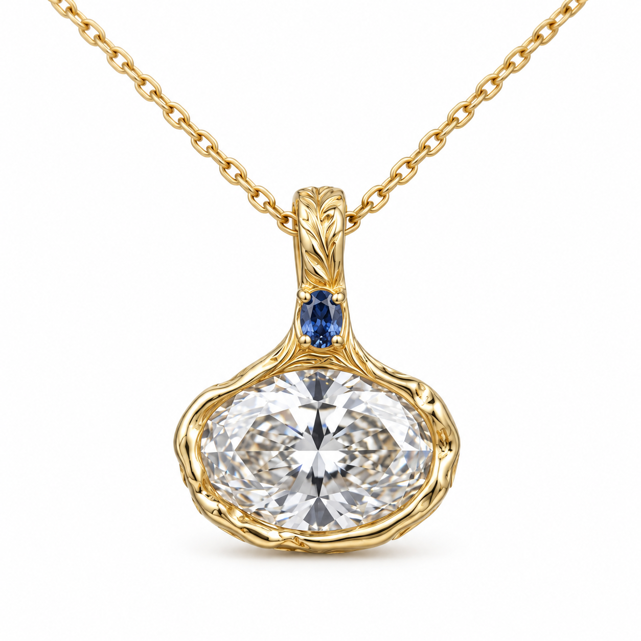 Front view of an oval-cut pendant with a blue accent and botanical gold setting on a white background.