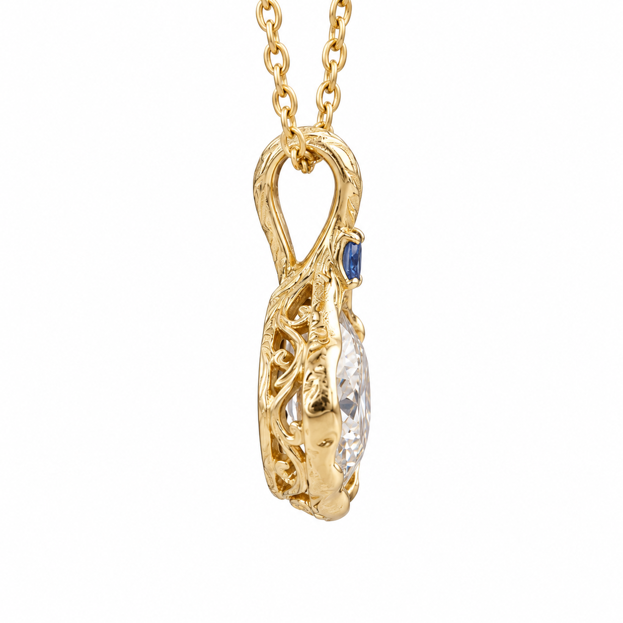 Side profile of the oval-cut pendant showing the openwork gallery and engraved bail on white.