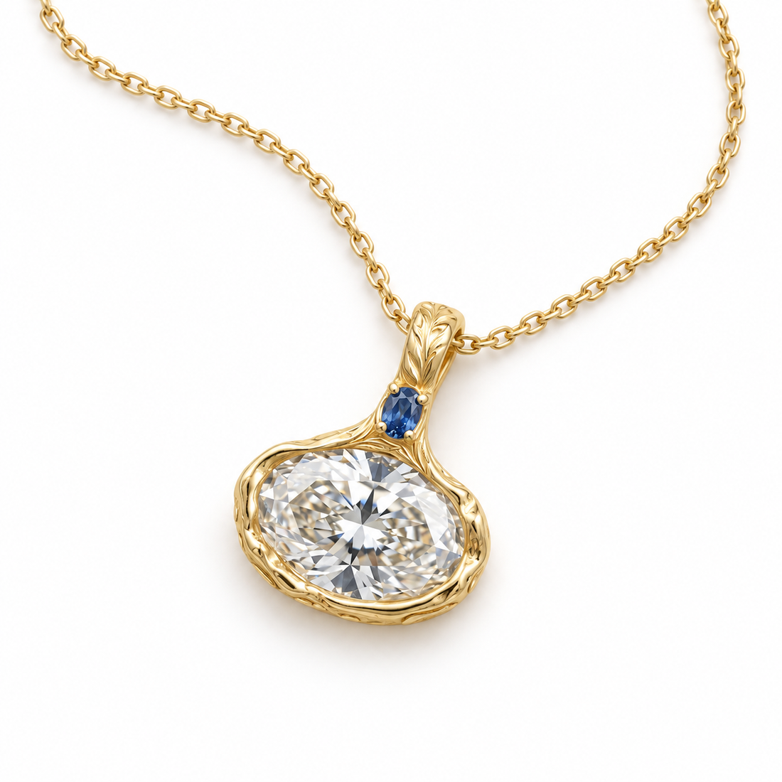 Oval-cut botanical pendant and fine chain arranged on a white surface.