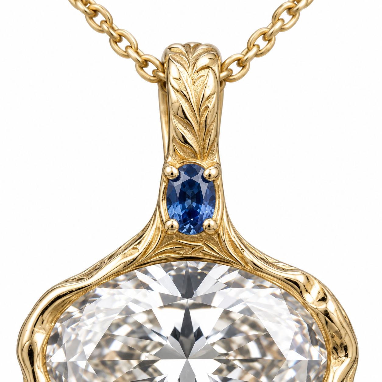 Close-up of the engraved botanical bail, blue accent stone and oval-cut center on white.