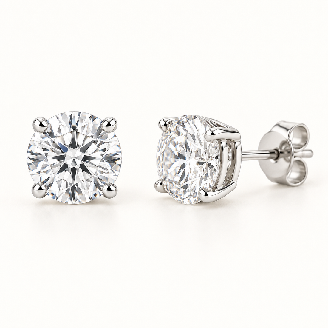 Round-cut lab-grown diamond stud earrings, front and side views