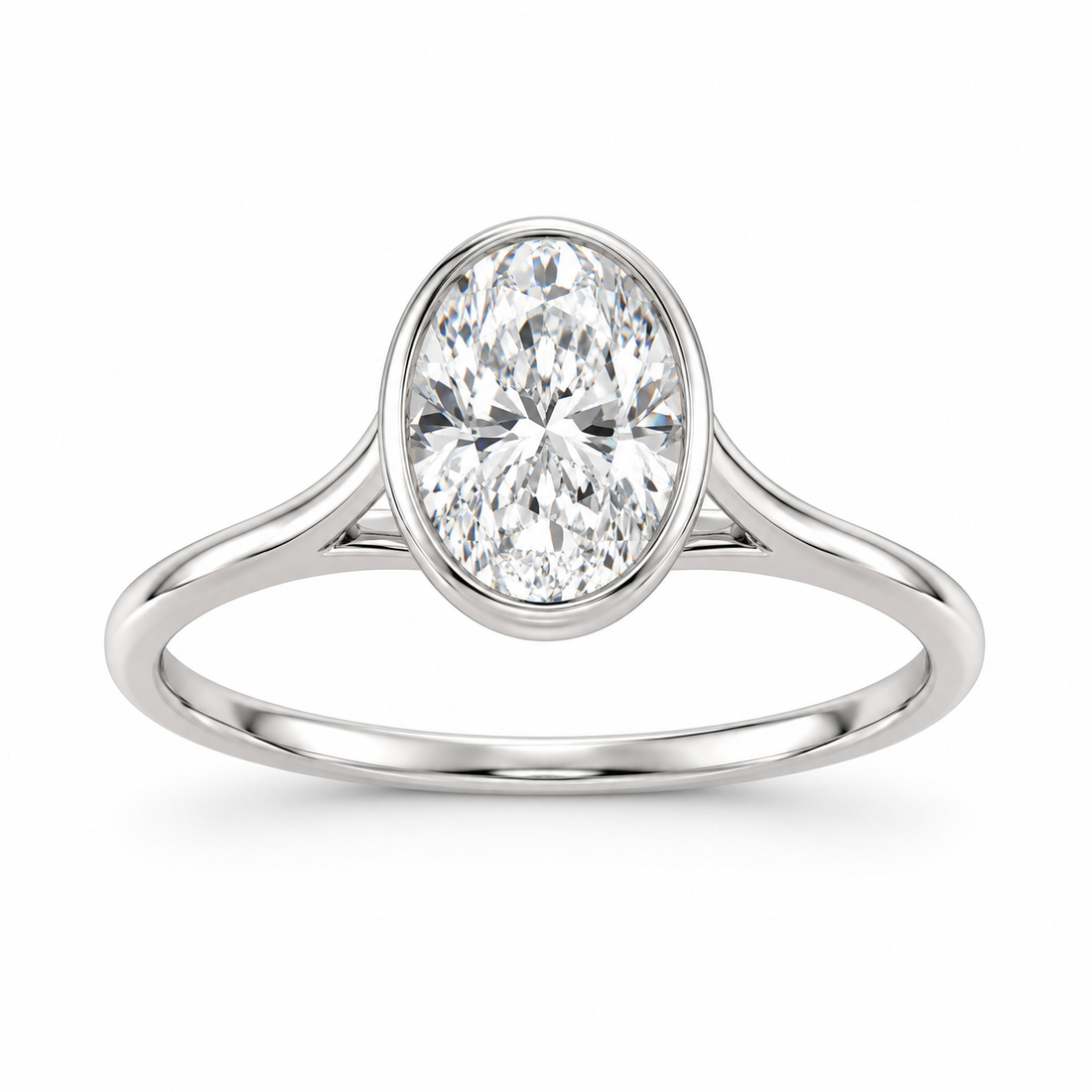 Oval-cut lab-grown diamond bezel-set solitaire engagement ring