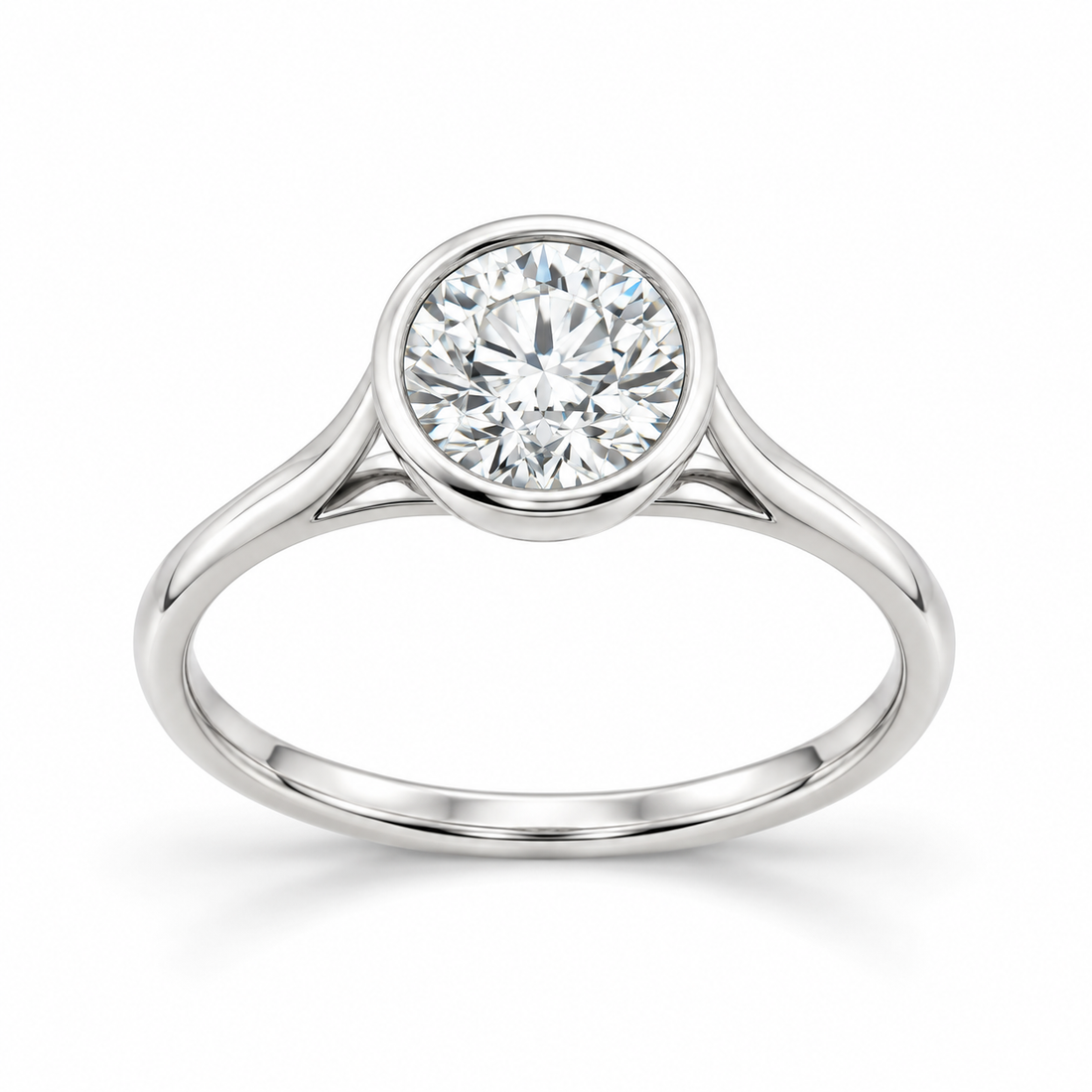Round-cut lab-grown diamond bezel-set solitaire engagement ring